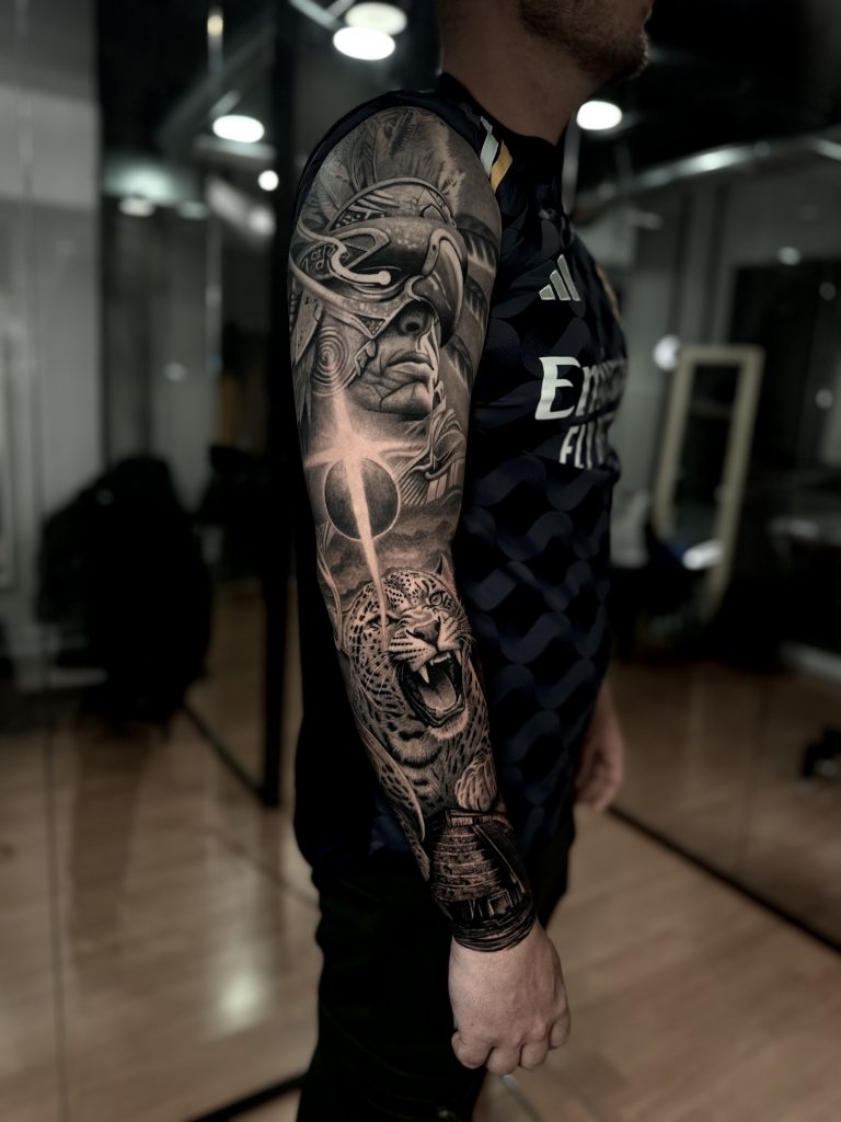 Realistic Black and Grey tattoo with deep shadows